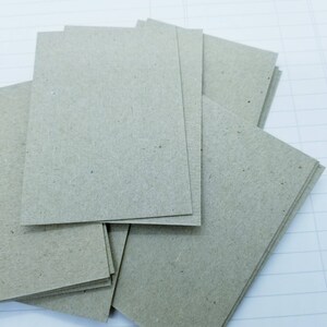 20 blancs ATC pour carton aggloméré de poids moyen - 2 1/2 x 3 1/2