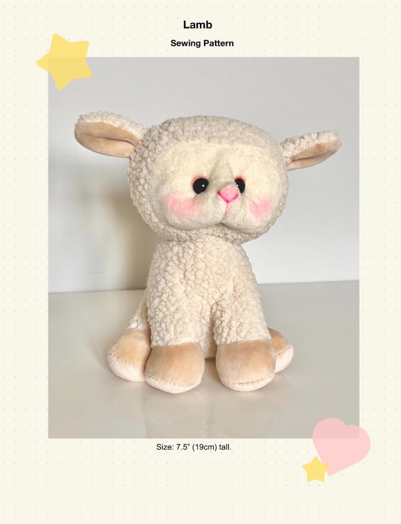 May include: A white plush lamb toy with pink cheeks and black eyes. The lamb is sitting with its legs tucked under its body. It is 7.5 inches (19 cm) tall.