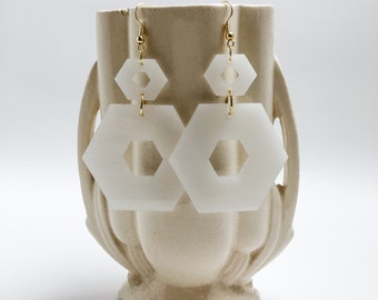 White Acrylic Hexagonal Dangling Earrings with Gold Accents