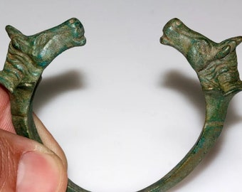 Ancient Roman bronze bracelet bangle decorated with horse heads circa 200-300 AD