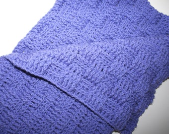 May include: A purple knitted scarf with a textured pattern.