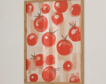 May include: A framed art print featuring a watercolor illustration of red tomatoes. The tomatoes are scattered across a beige and white striped background. The print is displayed on a white wall above a wooden table. A green pitcher and books are on the table.