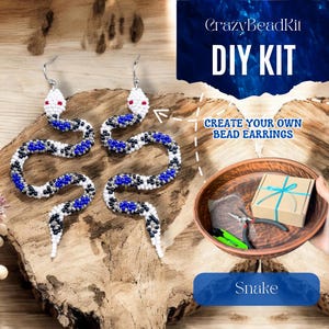 May include: A pair of snake-shaped beaded earrings with white, blue, and black beads. The earrings are displayed on a wooden surface next to a DIY kit with the text "CrazyBeadKit DIY KIT CREATE YOUR OWN BEAD EARRINGS Snake."