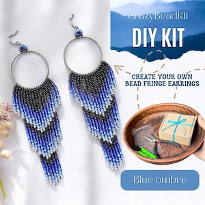 May include: DIY kit to create your own blue ombre bead fringe earrings. The kit includes all the materials needed to make a pair of earrings with a hoop and a long fringe of blue, black, and silver beads.
