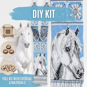May include: A DIY kit for a beaded loom necklace featuring a white horse portrait, geometric patterns in blue, white, and grey, and fringe at the bottom. The kit includes a loom, beads, thread, and a tutorial for creating this horse-themed accessory.