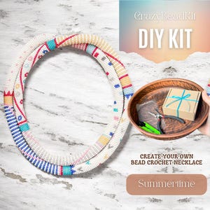 May include: A handmade bead crochet necklace in white, blue, red, and yellow. The image also shows a DIY kit with tools and a small box tied with a blue ribbon. Text on the image reads "CrazyBeadKit DIY KIT" and "CREATE YOUR OWN BEAD CROCHET NECKLACE".