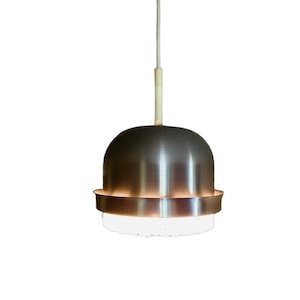May include: A silver pendant light with a white frosted glass shade. The light has a simple, modern design.
