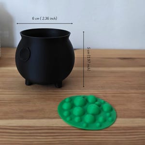 Black cauldron with removable insert and size reference, 3D printed Halloween decor