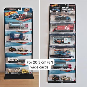 Peut inclure: Présentation de voitures miniatures Hot Wheels, comprenant des camions et des voitures de sport, dans leur emballage d'origine. Les cartes mesurent 20,3 cm de large. Les emballages affichent les logos Hot Wheels et Fast & Furious.