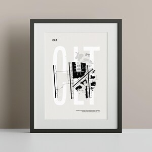 Minimalist black and white map poster of Charlotte Douglas International Airport, showcasing the layout of runways and terminals.