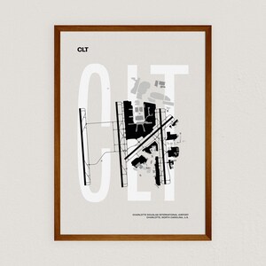 Minimalist black and white map poster of Charlotte Douglas International Airport, showcasing the layout of runways and terminals.