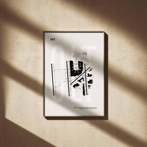 Minimalist black and white map poster of Charlotte Douglas International Airport, showcasing the layout of runways and terminals.