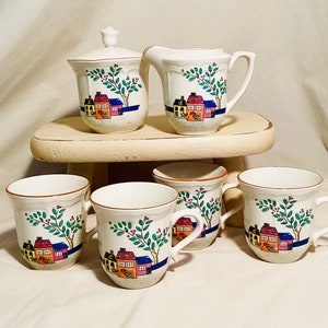 Vintage stoneware set of 4 mugs, creamer and sugar with lid