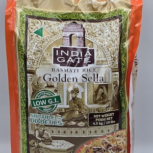 May include: A bag of India Gate Basmati Rice Golden Sella. The packaging is orange and gold, with illustrations of people and architecture. The bag states it is suitable for diabetics and has a net weight of 10 lbs.