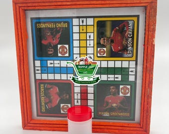 Ludo board game with dice and 2 seeds