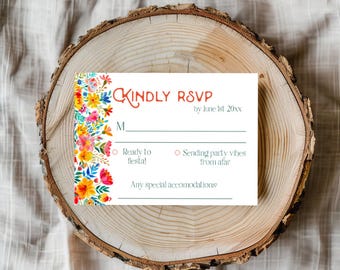 May include: A white RSVP card with a floral border and the text "KINDLY RSVP by June 1st 20xx". The card has a line for a name, two options for responding, and a space for any special accommodations.