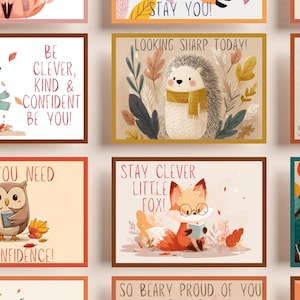 May include: A collection of framed art prints featuring adorable woodland animal illustrations. Each print has a unique design with encouraging phrases like "Be Clever, Kind & Confident Be You!" and "Looking Sharp Today!" The color palette includes warm autumn tones.