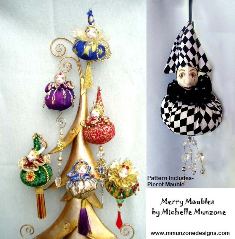May include: A set of six handmade fabric ornaments shaped like jesters. The ornaments are decorated with various colors and patterns, including red, gold, green, blue, and purple. The ornaments are hanging from a gold metal tree stand. The text "Merry Maubles by Michelle Munzone" is printed below the ornaments.