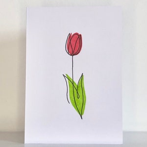 Élégante carte de voeux fleur sur une ligne, design minimaliste, tulipe