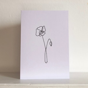 Biglietto d'auguri con fiori a una riga in bianco e nero dal design minimalista