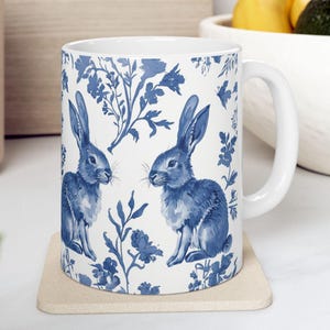 Vintage Blue Rabbit Ceramic Mug, Elegant Floral Easter Design