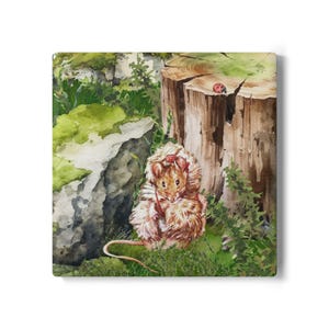 May include: Watercolor painting of a mouse in a forest setting. The mouse is brown and white with a red bow. The background includes a tree stump, rocks, and green foliage. A ladybug rests on the stump.