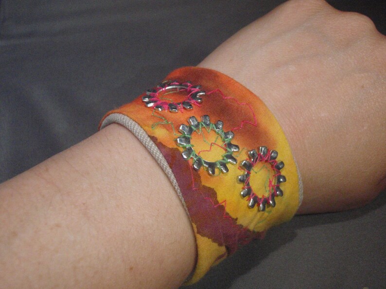 Batik Tie dyed Quilted cuff bracelet embellished with gears image 0