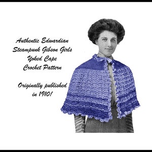 May include: A vintage crochet pattern for a yoked cape, originally published in 1910. The pattern is for a blue cape with a scalloped edge. The image shows a woman wearing the cape.