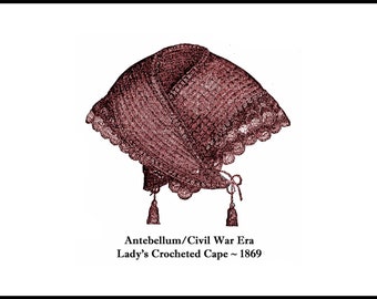 May include: A vintage crocheted cape with a scalloped edge and tassels. The cape is a deep burgundy color and is labeled "Antebellum/Civil War Era Lady's Crocheted Cape ~ 1869".