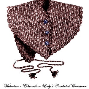 May include: A vintage, crocheted crossover collar in a brown hue, featuring a detailed openwork pattern and scalloped edges. The collar has three blue buttons and a tie closure with tassels. Text at the bottom reads "Victorian - Edwardian Lady's Crocheted Crossover Originally Published - 1902."