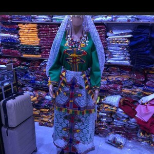 An old fashioned clothes for women. And Ladies ancient cultural dress from north Africa accurately Morocco amazigh dress fascinating colors zdjęcie 7