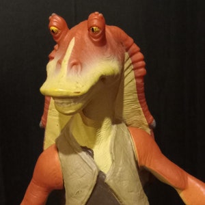 JarJar Binks 7in figure. Disney&#39;s Star Wars Episode 1 vinyl figure with poseable arms. Applause