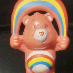 1983 Vintage Cheer Bear Care Bear holding Rainbow pvc 1in figure