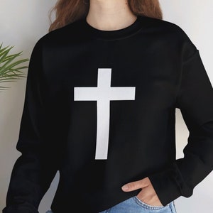 White cross sweater hot sale