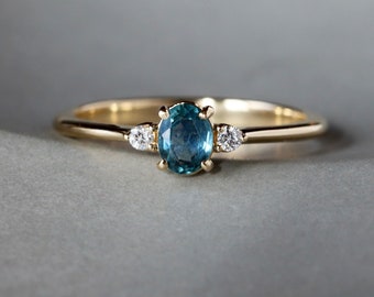 Montana Sapphire Ring with Accent Diamonds, Dainty Three Stone Engagement Ring, Solid 14k Gold with Teal Blue Oval Sapphire