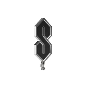 May include: A silver-colored pendant featuring a stylized, three-dimensional letter "S" in black. The design has a geometric, angular outline, with a small loop at the bottom for a chain or attachment. The pendant is set against a white background.