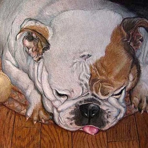 May include: A white and brown bulldog with a pink tongue sticking out is lying on a patterned rug. The dog has its eyes closed and appears to be sleeping. A brown and white baseball is in the foreground.