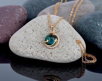 Gold Planet Necklace – Saturn Pendant with Green Stone, CZ Halo, Star & Moon, Celestial Jewelry