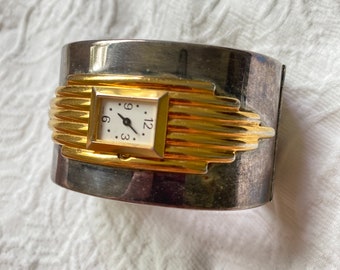 ALFRED DURANTE Pulsera de reloj Art Déco de metal dorado plateado