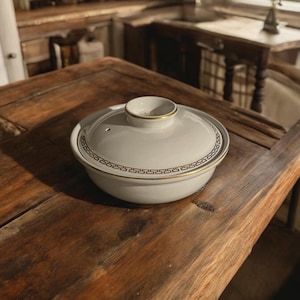 The Hall China Company Vintage Casserole Dish With Vented Lid Trimmed in Gold