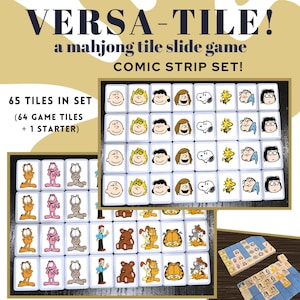 May include: A set of 65 mahjong tiles featuring characters from the Peanuts comic strip. The tiles are white with colorful images of Charlie Brown, Snoopy, Lucy, and Linus. The tiles are arranged in a grid pattern on a wooden surface. The text "VERSA-TILE!" and "COMIC STRIP SET!" is printed on the image. The text "65 TILES IN SET (64 GAME TILES + 1 STARTER)" is also printed on the image.