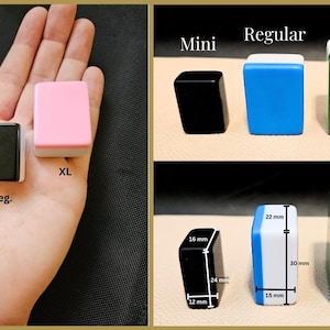 May include: Three different sizes of mahjong tiles: mini, regular, and extra large. The mini tile is pink, the regular tile is black, and the extra large tile is pink. The tiles are shown on a hand, with measurements in millimeters.