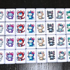 38 tiles featuring various cartoon characters. Each tile displays a different character in various costumes:  white, light blue, purple, red, and green.  The characters are predominantly cats and stitch-like creatures, each wearing a bow. The tiles are arranged in a grid pattern, creating a visually appealing collection of colorful cartoon characters.
