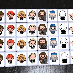 May include: A set of 36 white square tiles with colorful cartoon images of Harry Potter characters. Each tile features a different character, including Harry Potter, Ron Weasley, Hermione Granger, Draco Malfoy, and more. The tiles are perfect for playing a game of matching or for use as decorative accents.