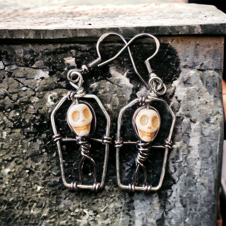 skeleton in coffin earrings image 1