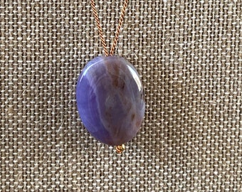 Purple agate focal bead pendant on silk cord necklace