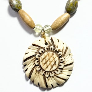 Elegant Hand-Carved Floral Pendant Necklace - Botanical Jewelry by Julia Lee
