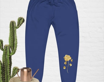 Unisex fleece sweatpants It contains a golden rose and beautiful and distinctive pants