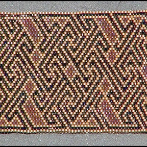 May include: A close-up of a beaded bracelet with a geometric pattern in shades of brown, black, and gold.