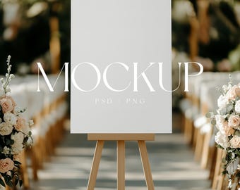 May include: A white blank sign on an easel with the word "MOCKUP" and "PSD/PNG" written on it. The sign is set up in front of a row of chairs decorated with flowers.